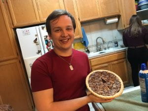 Nathan proudly displaying his pecan pie.
