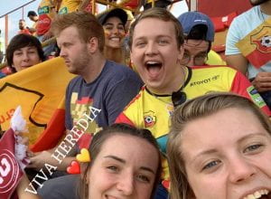 Nathan and his friends at an Herediano soccer game